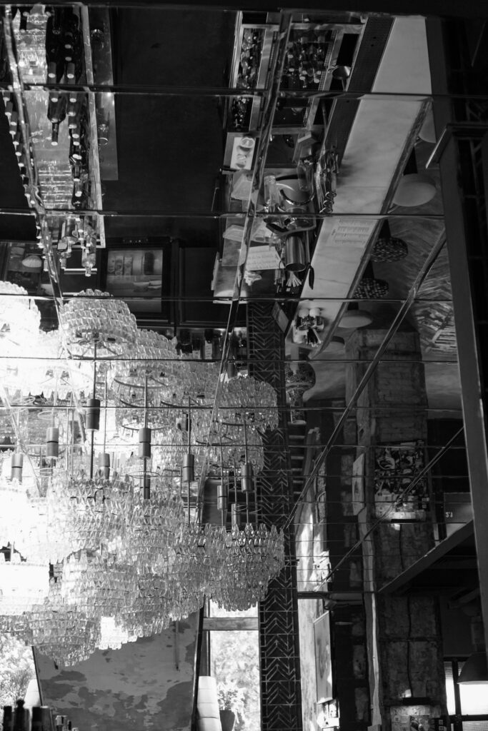 Luxury mirrored ceiling adding depth and light to room